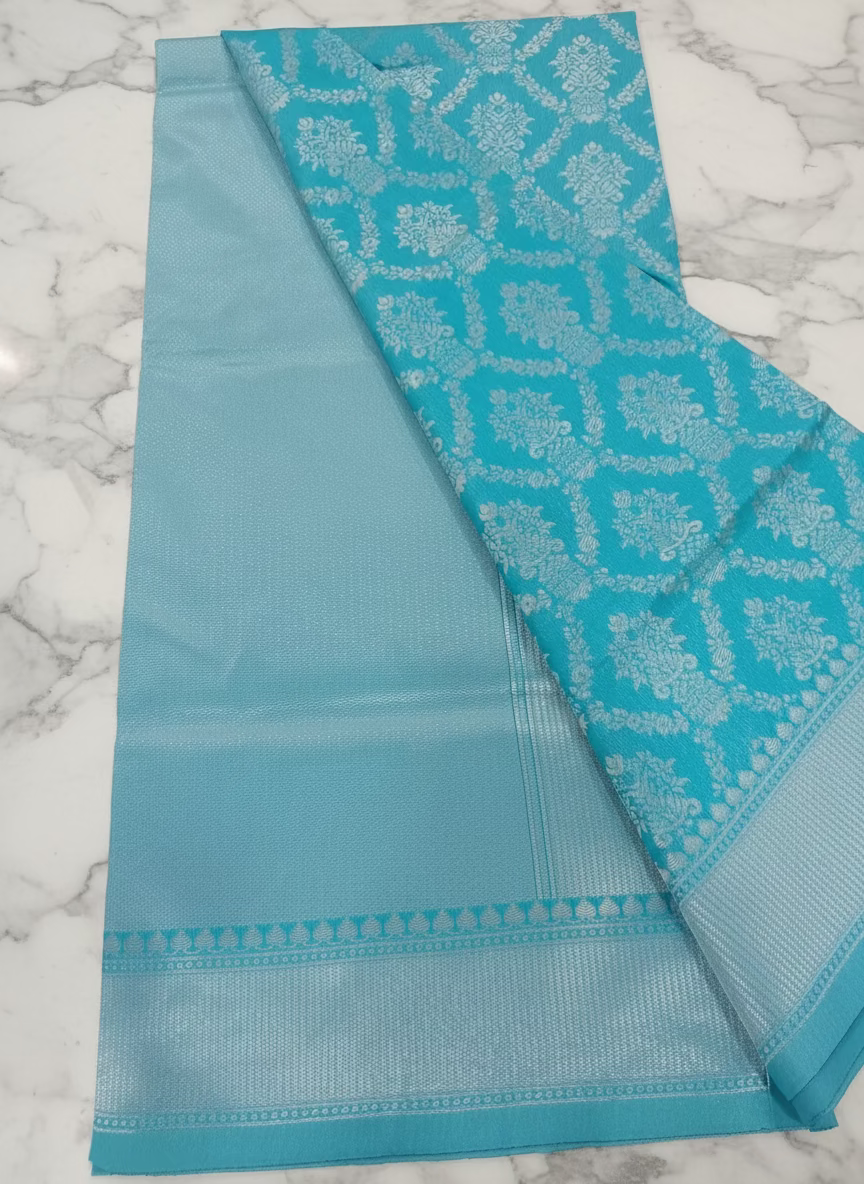 Semi Kanchipuram Silk Saree with Gold Zari Buttas and Pallu in Artic Blue Color