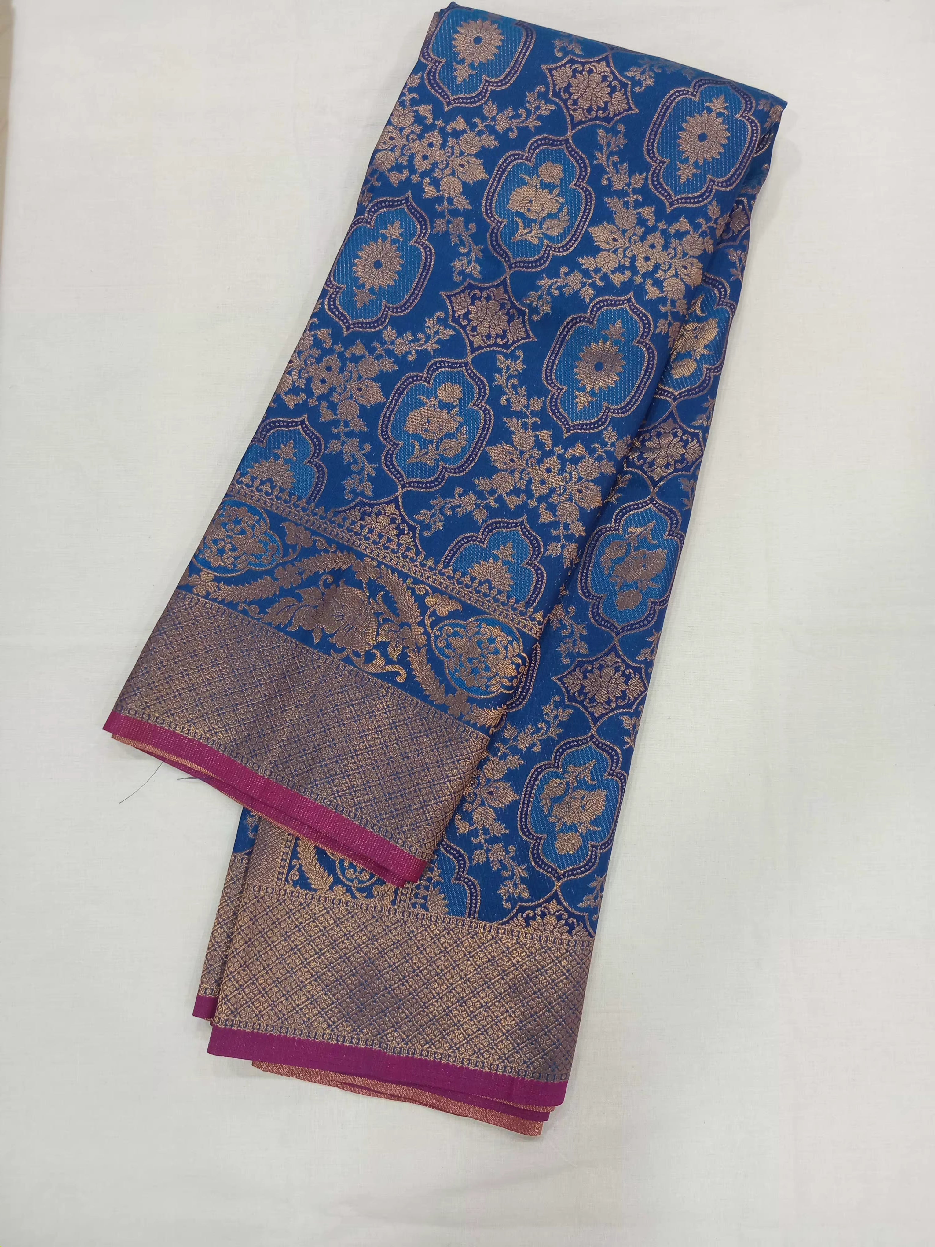Kanchipuram Pure Silk Saree with detailed Butta motifs and luxurious Pallu in Royal Blue color