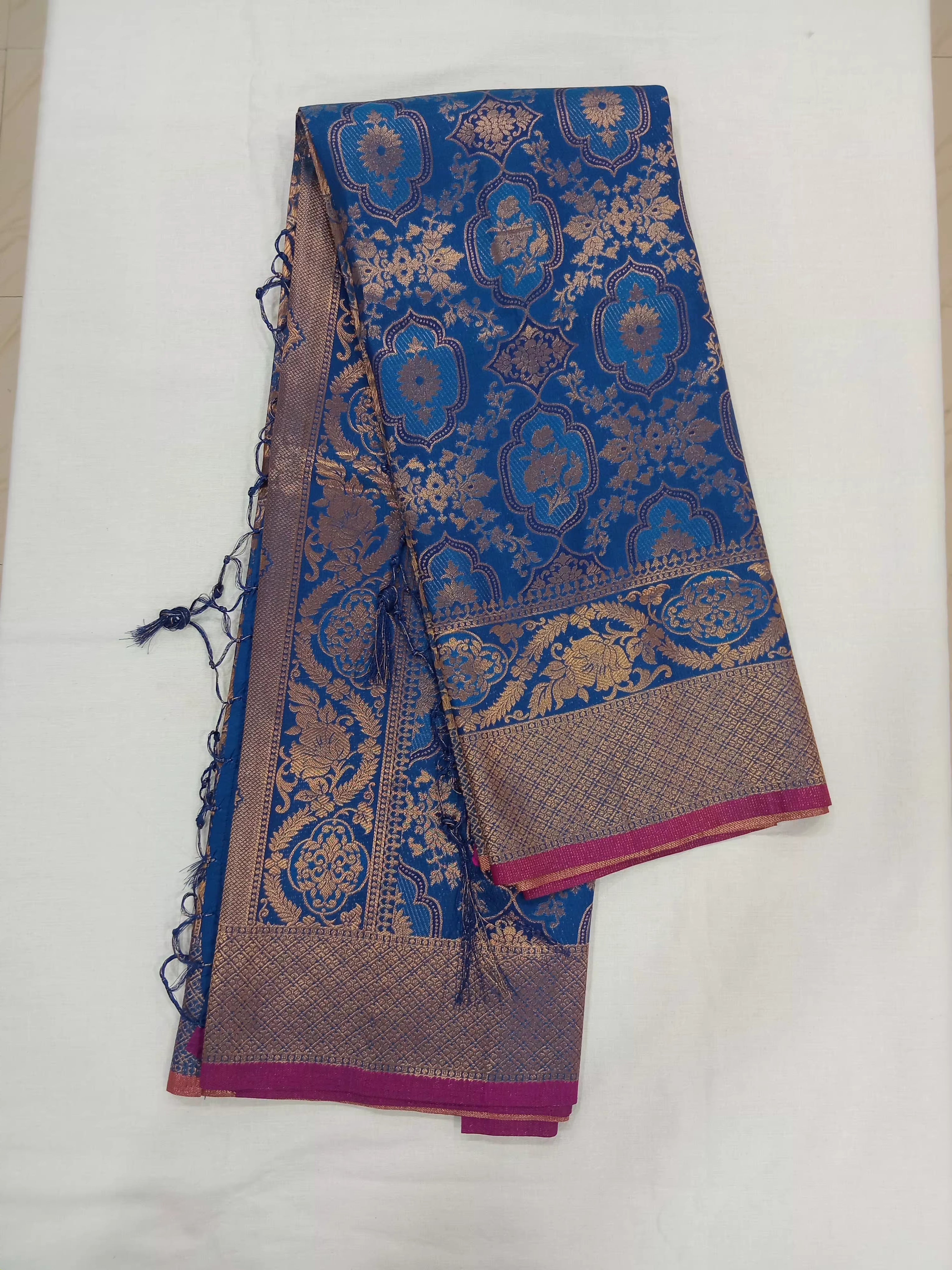 Kanchipuram Pure Silk Saree with detailed Butta motifs and luxurious Pallu in Royal Blue color