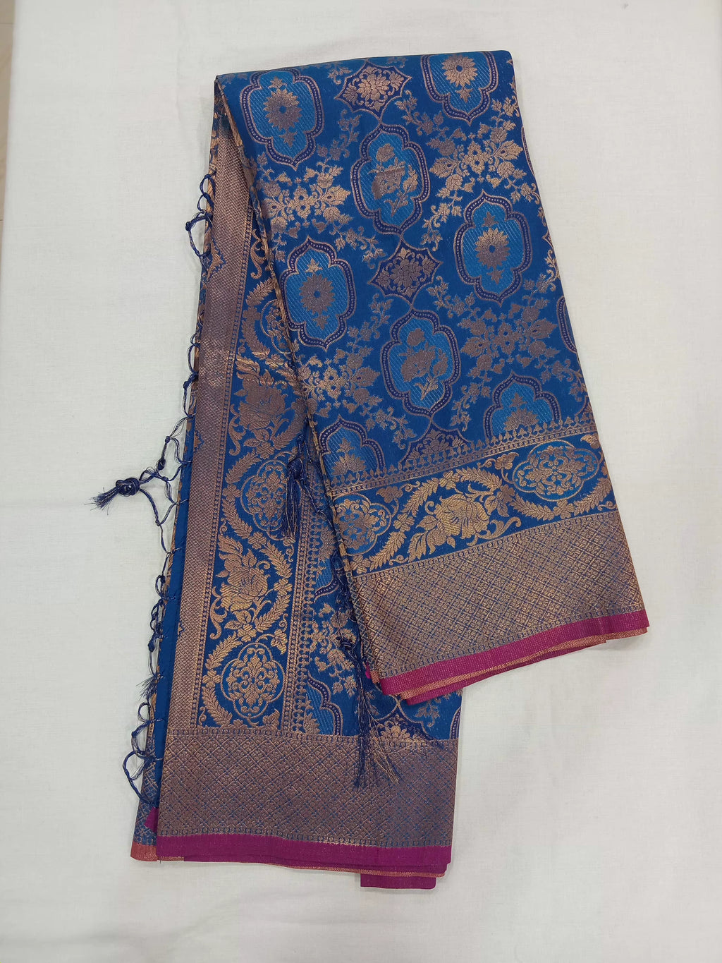 Kanchipuram Pure Silk Saree with detailed Butta motifs and luxurious Pallu in Royal Blue color