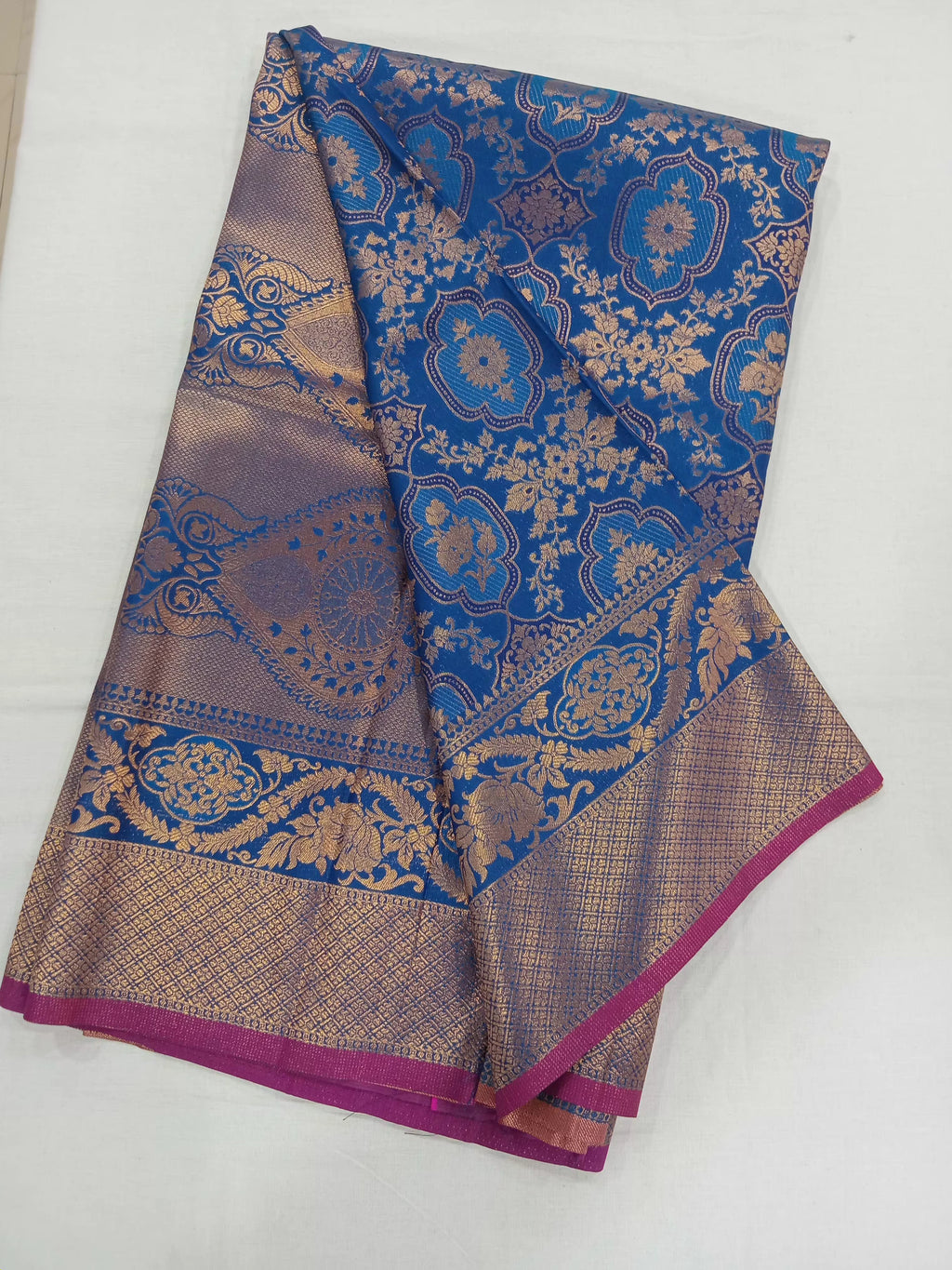 Kanchipuram Pure Silk Saree with detailed Butta motifs and luxurious Pallu in Royal Blue color