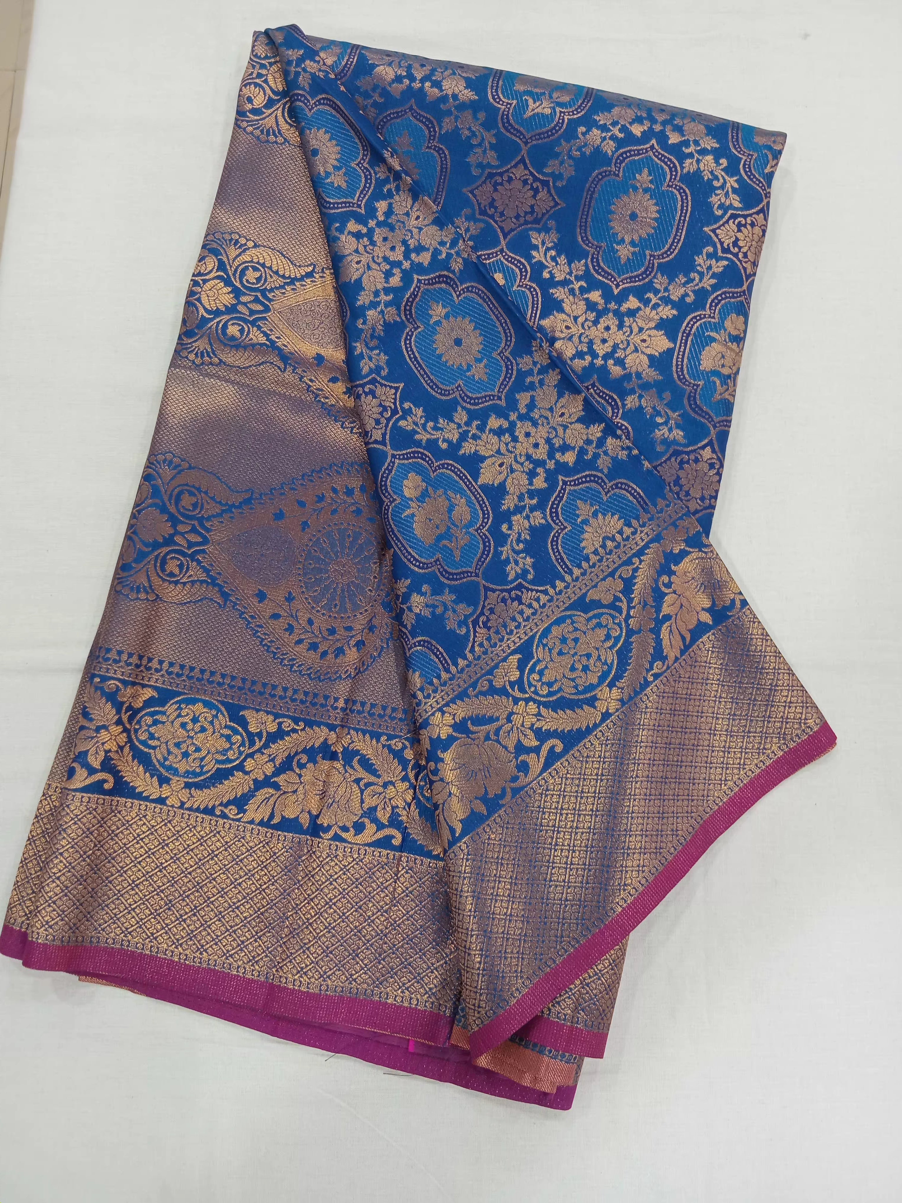 Kanchipuram Pure Silk Saree with detailed Butta motifs and luxurious Pallu in Royal Blue color