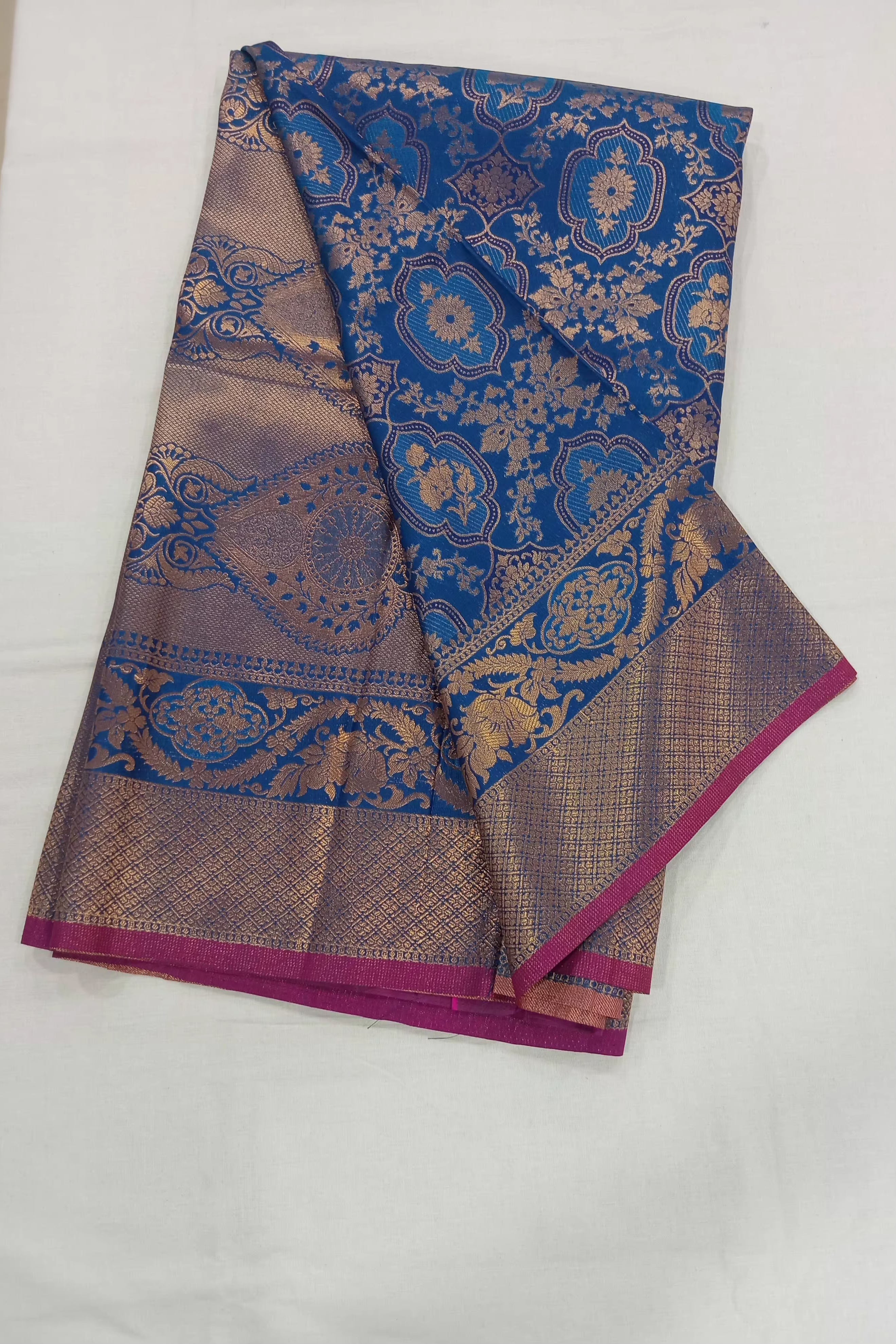 Kanchipuram Pure Silk Saree with detailed Butta motifs and luxurious Pallu in Royal Blue color