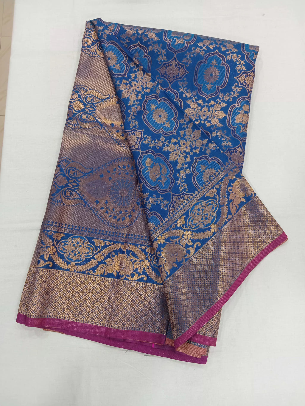 Kanchipuram Pure Silk Saree with detailed Butta motifs and luxurious Pallu in Royal Blue color