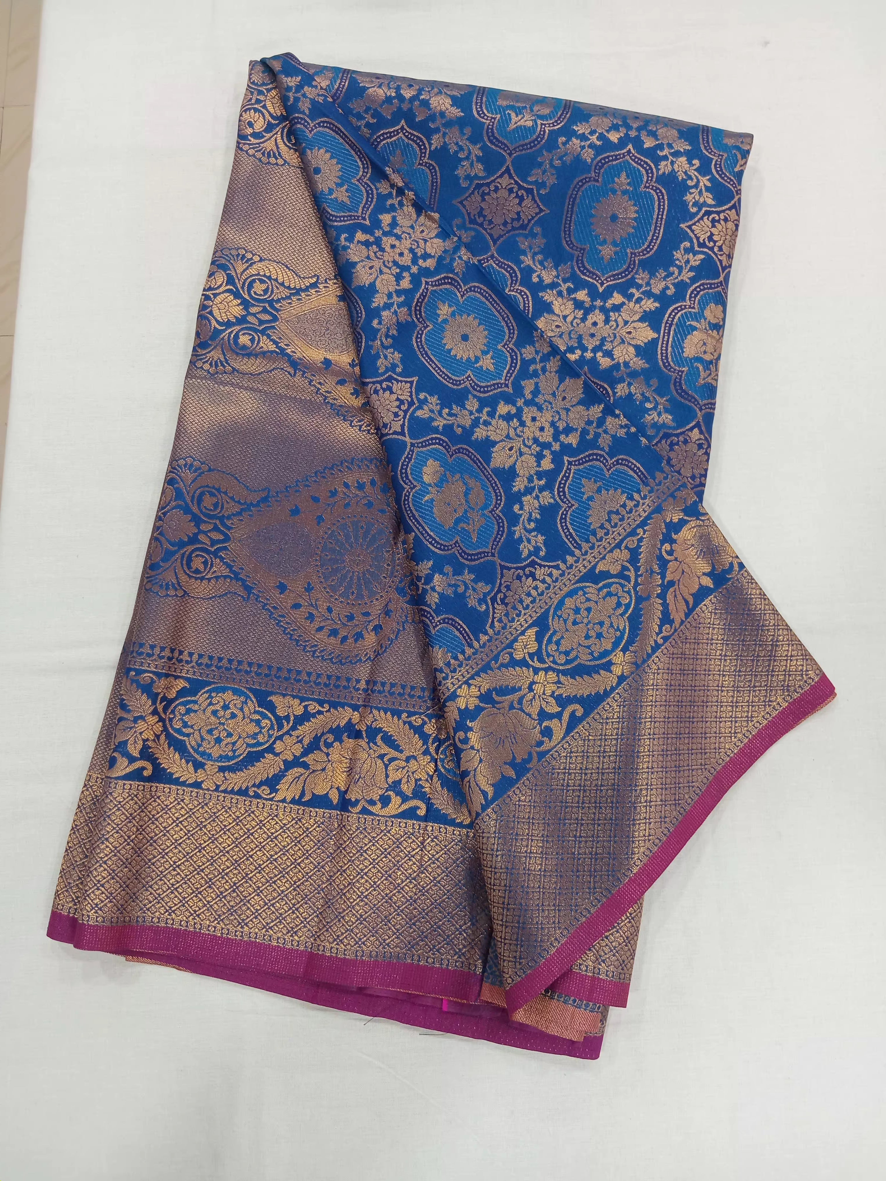 Kanchipuram Pure Silk Saree with detailed Butta motifs and luxurious Pallu in Royal Blue color