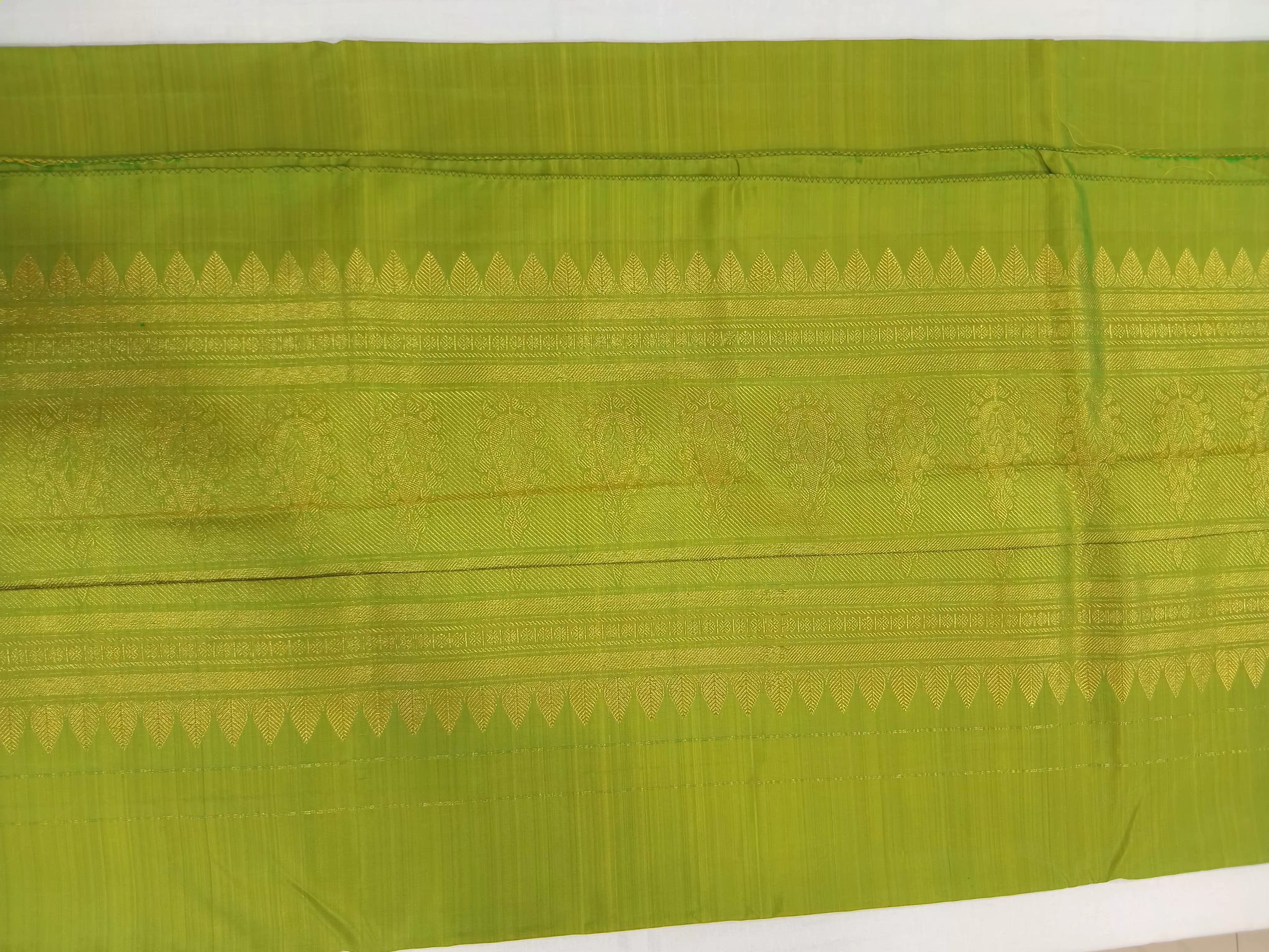 Kanchipuram Pure Silk Saree with bright gold Zari Motifs in Fresh Green leaf Color