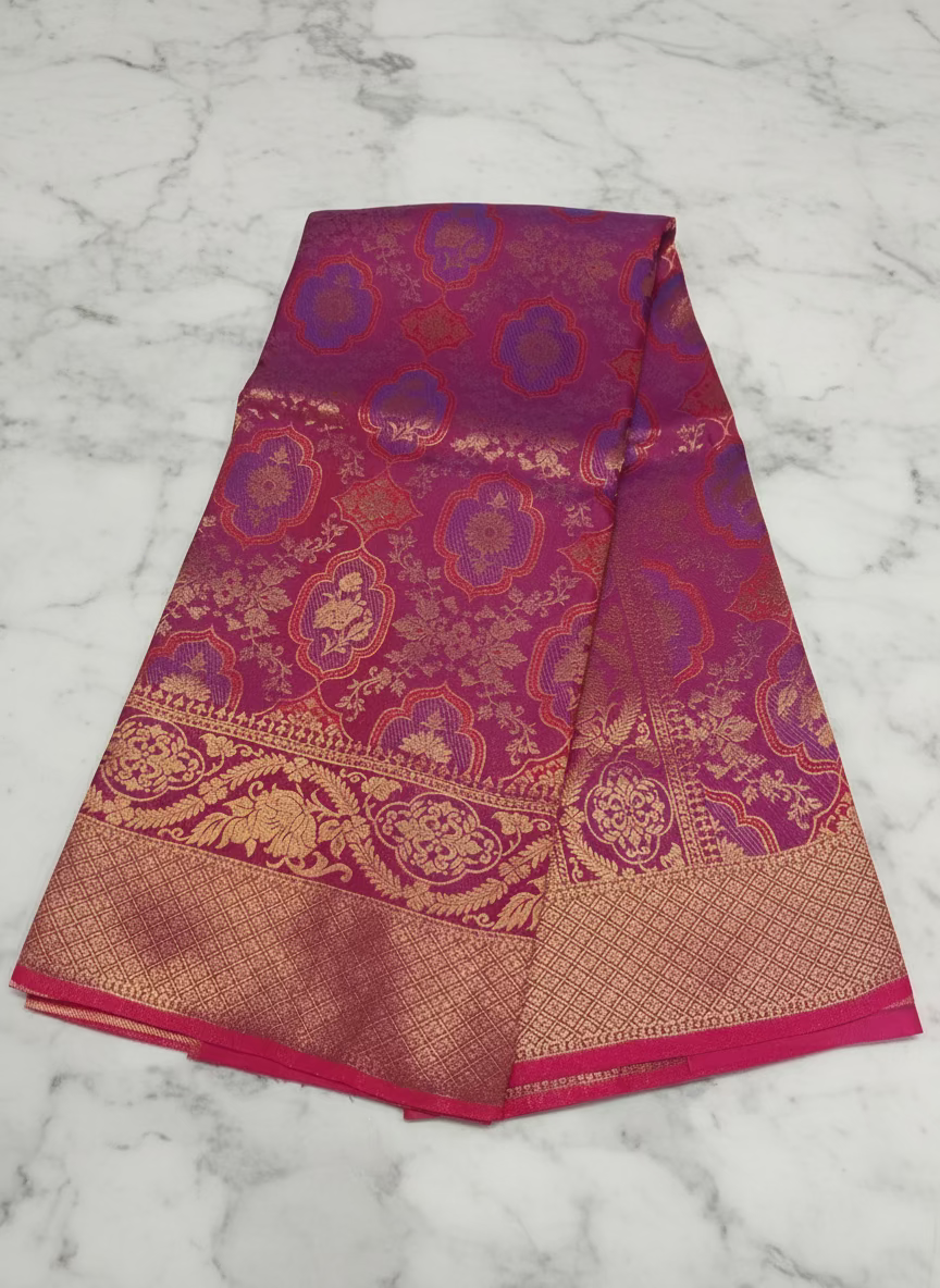 Kanchipuram Pure Silk Saree with detailed Butta motifs and luxurious Pallu in Reddish Pink color