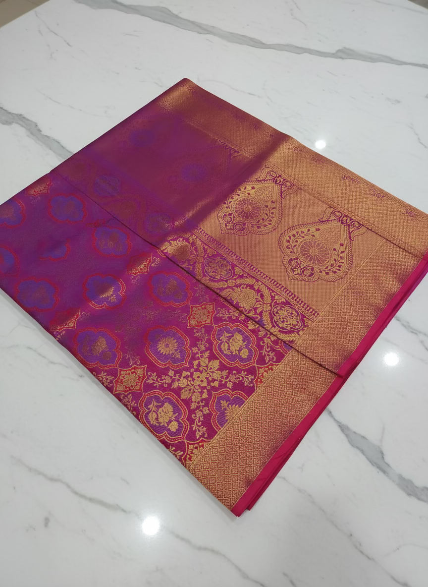 Kanchipuram Pure Silk Saree with detailed Butta motifs and luxurious Pallu in Reddish Pink color