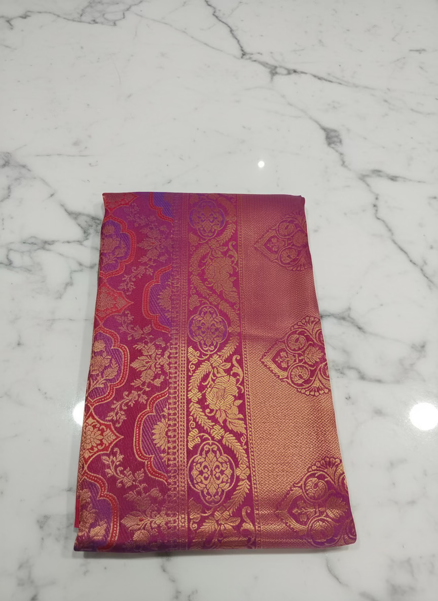 Kanchipuram Pure Silk Saree with detailed Butta motifs and luxurious Pallu in Reddish Pink color