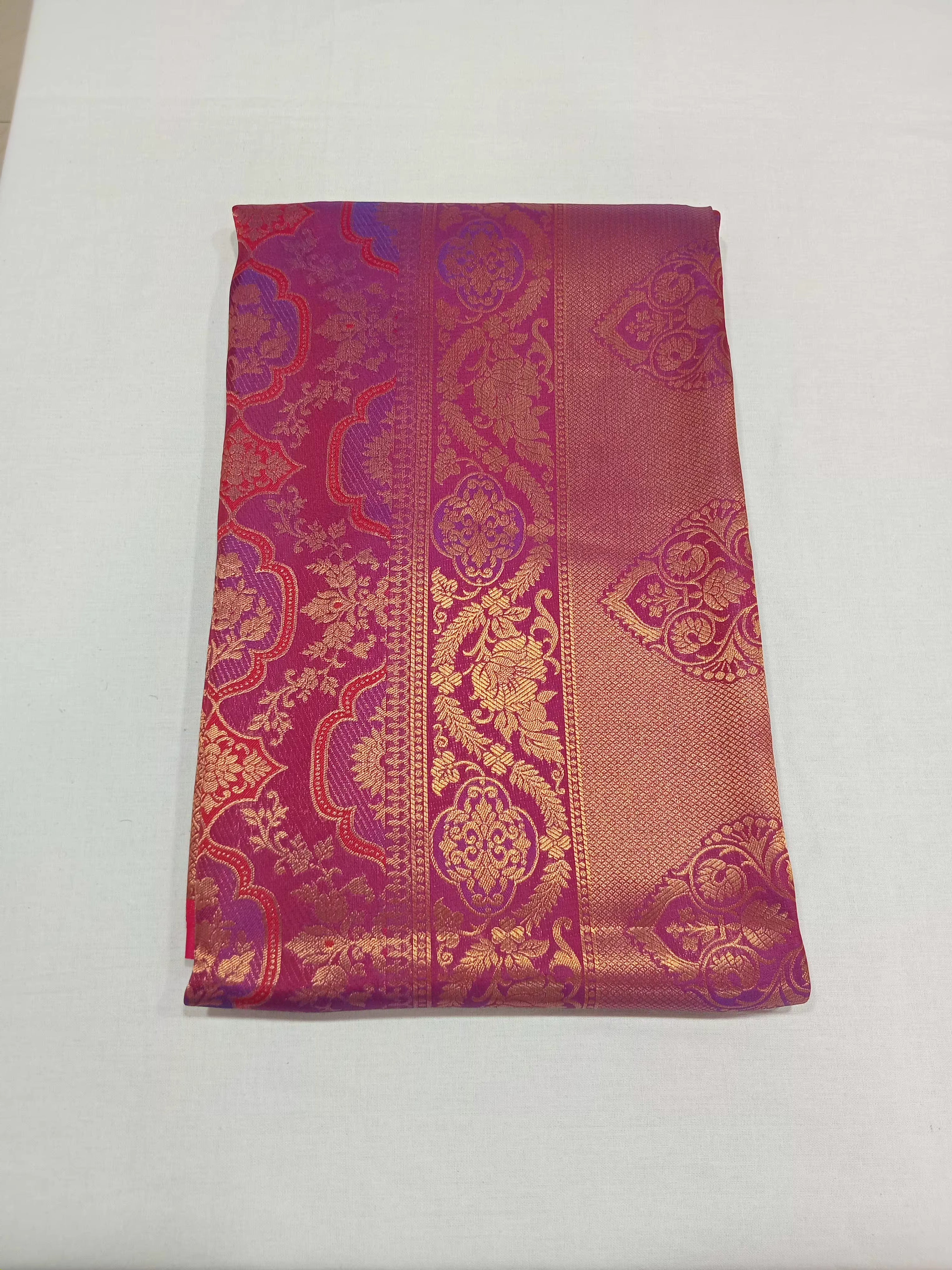 Kanchipuram Pure Silk Saree with detailed Butta motifs and luxurious Pallu in Reddish Pink color