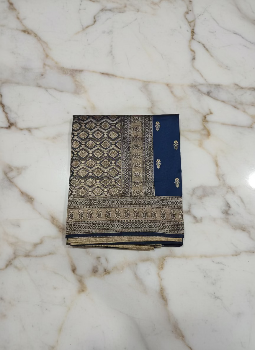 Banarasi Pure Silk Saree with mini gold zari butta motif all over saree with elaborate gold zari border and pallu in Navy Blue color