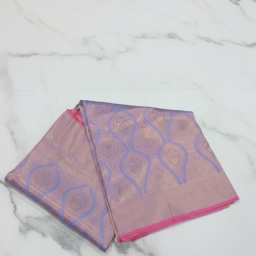 Kanchipuram Pure Silk Saree with detailed Butta motifs and luxurious Pallu in Lilac Purple color