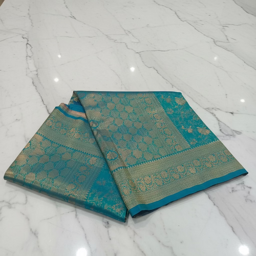 Aqua Blue Kanchipuram pure silk saree with detailed zari buttas