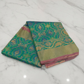 Kanchipuram Pure Silk Saree with detailed Butta motifs and luxurious Pallu in Blue Green color