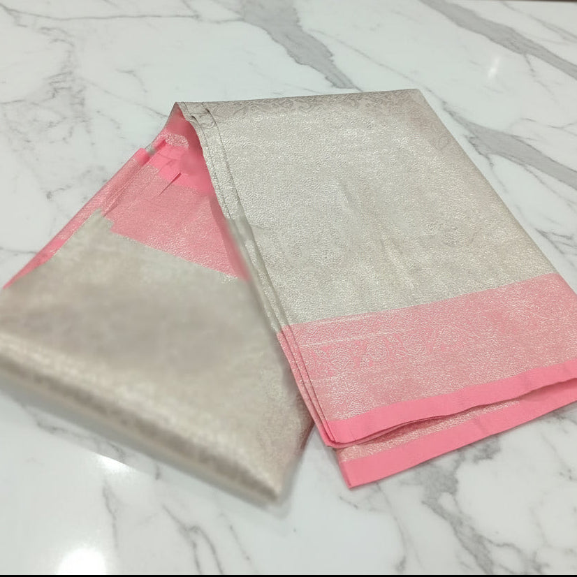 Kanchipuram Pure Silk Saree with detailed Butta motifs and luxurious Pallu in Cream Peach color