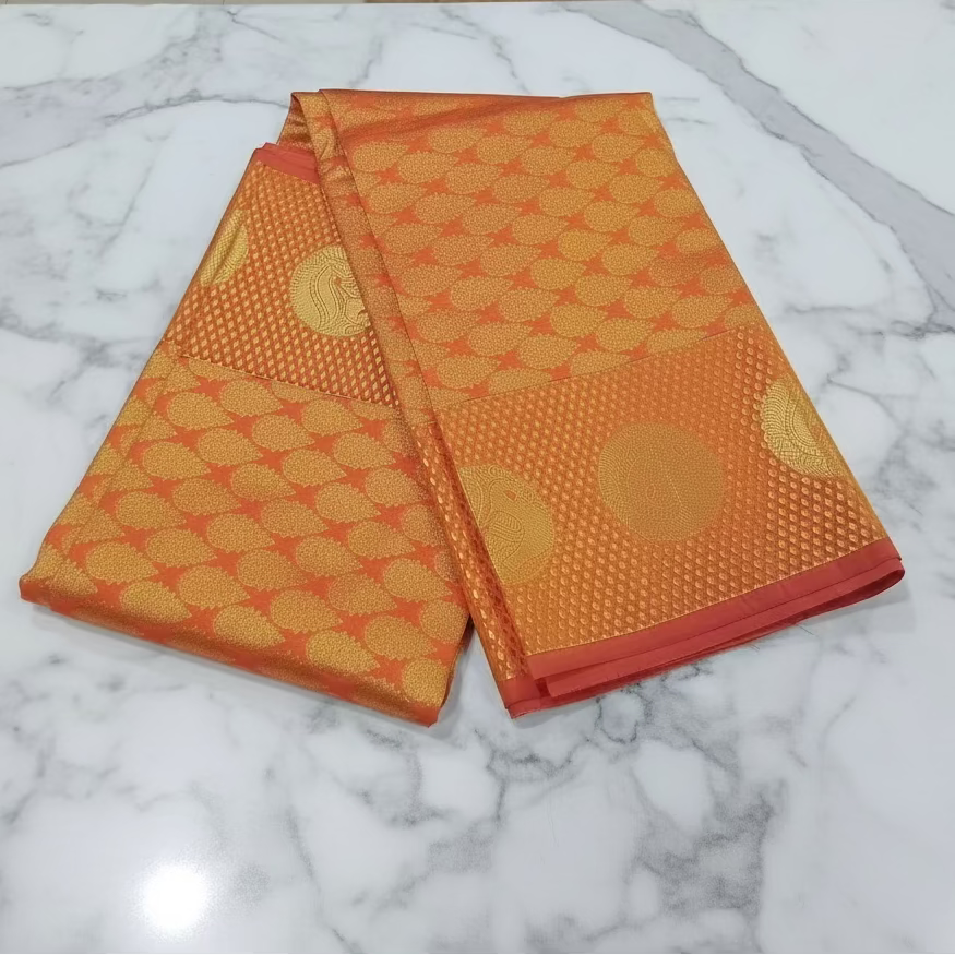 Kanchipuram Pure Silk saree with Intricate Gold Butta Motifs in Marigold Yellow Orange Color