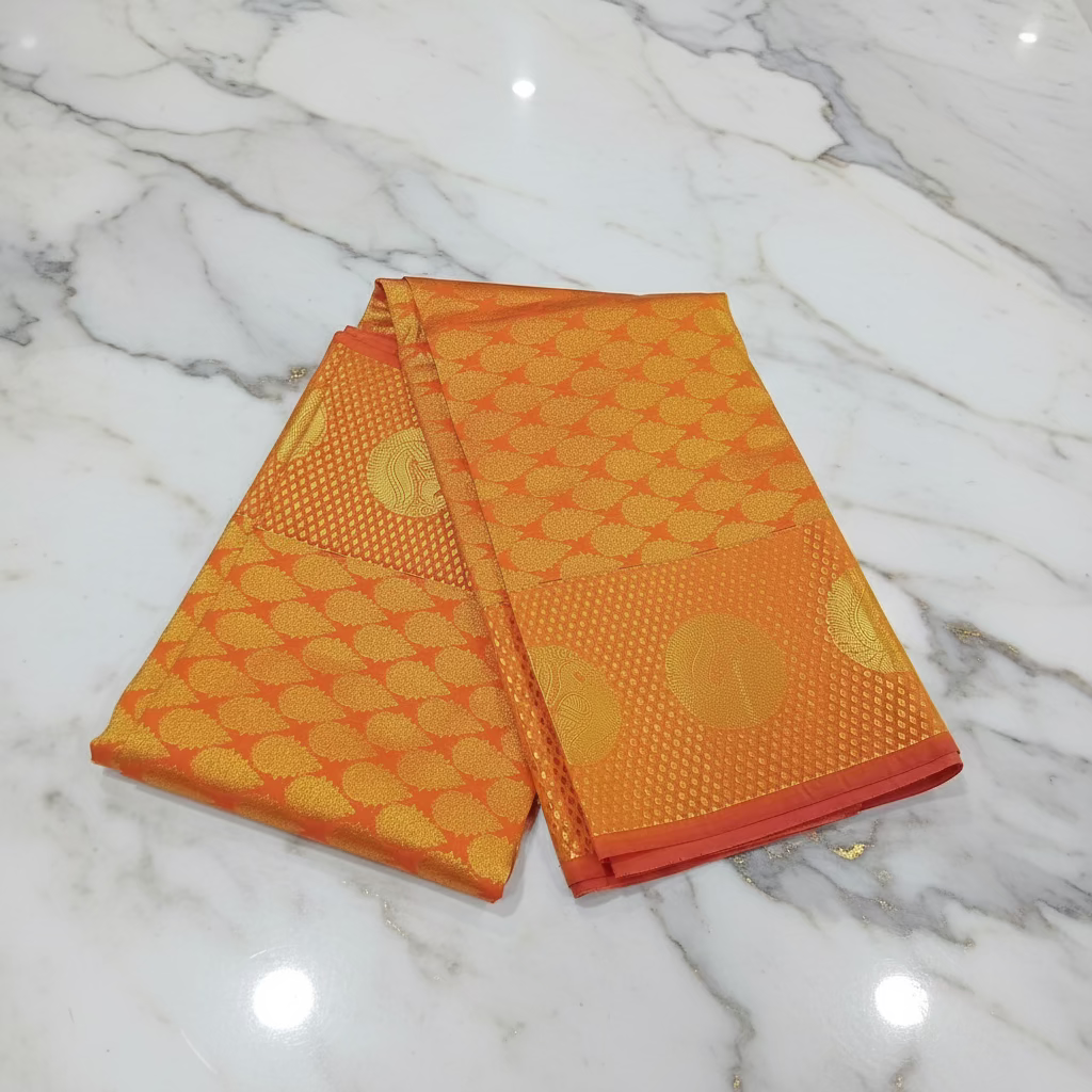 Kanchipuram Pure Silk saree with Intricate Gold Butta Motifs in Marigold Yellow Orange Color