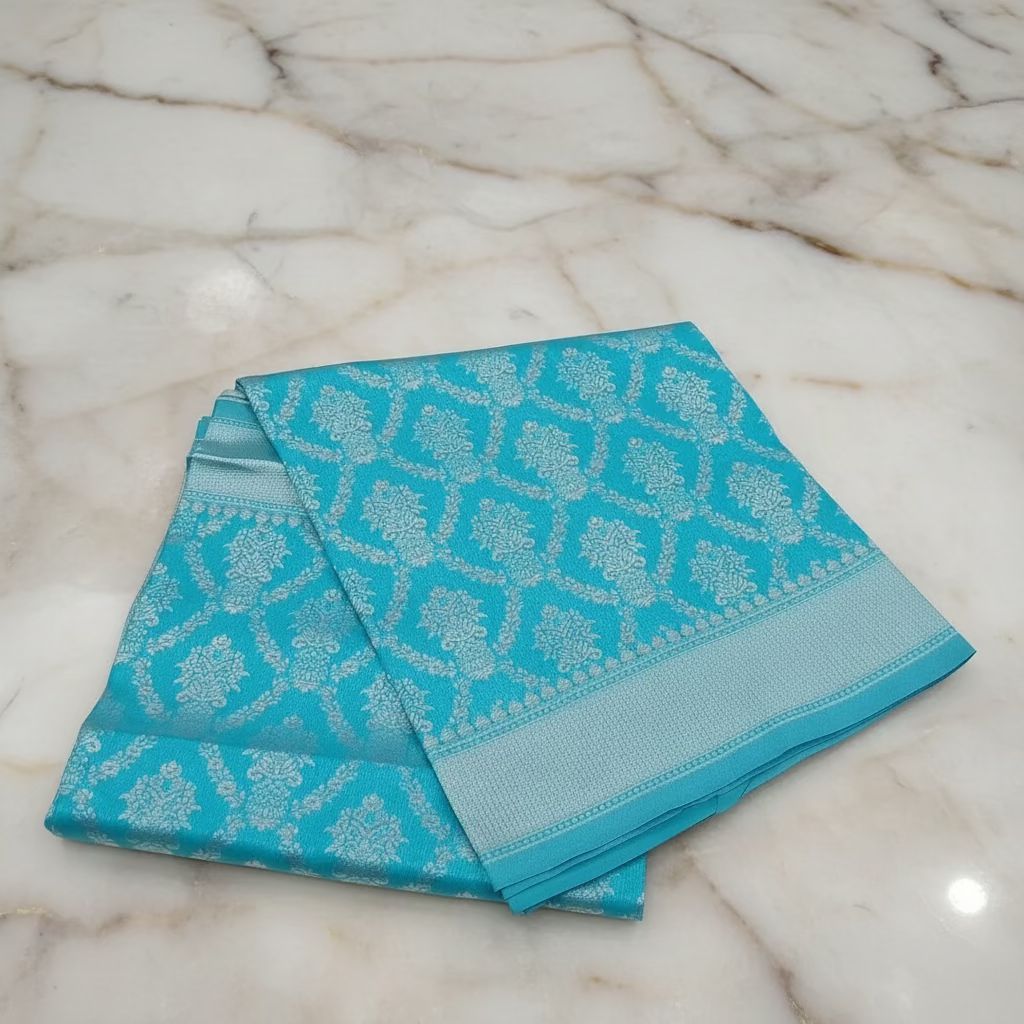 Semi Kanchipuram Silk Saree with Gold Zari Buttas and Pallu in Artic Blue Color