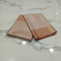Semi Kanchipuram Silk Saree with Gold Zari Buttas and Shimmered shine in Coral Light Peach Color