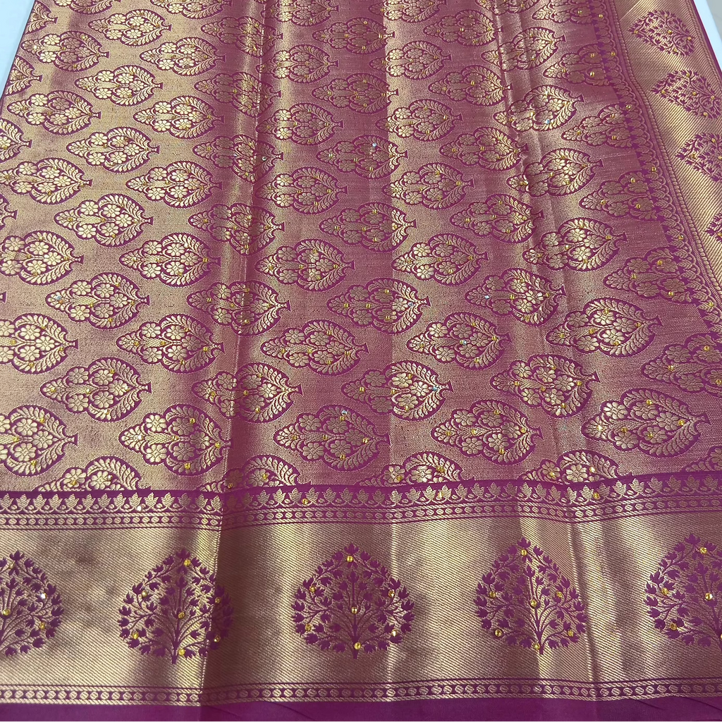 Kanchipuram Pure Silk Saree with detailed Gold Zari Butta motifs and luxurious Pallu with stick on Minakari in Maroon color