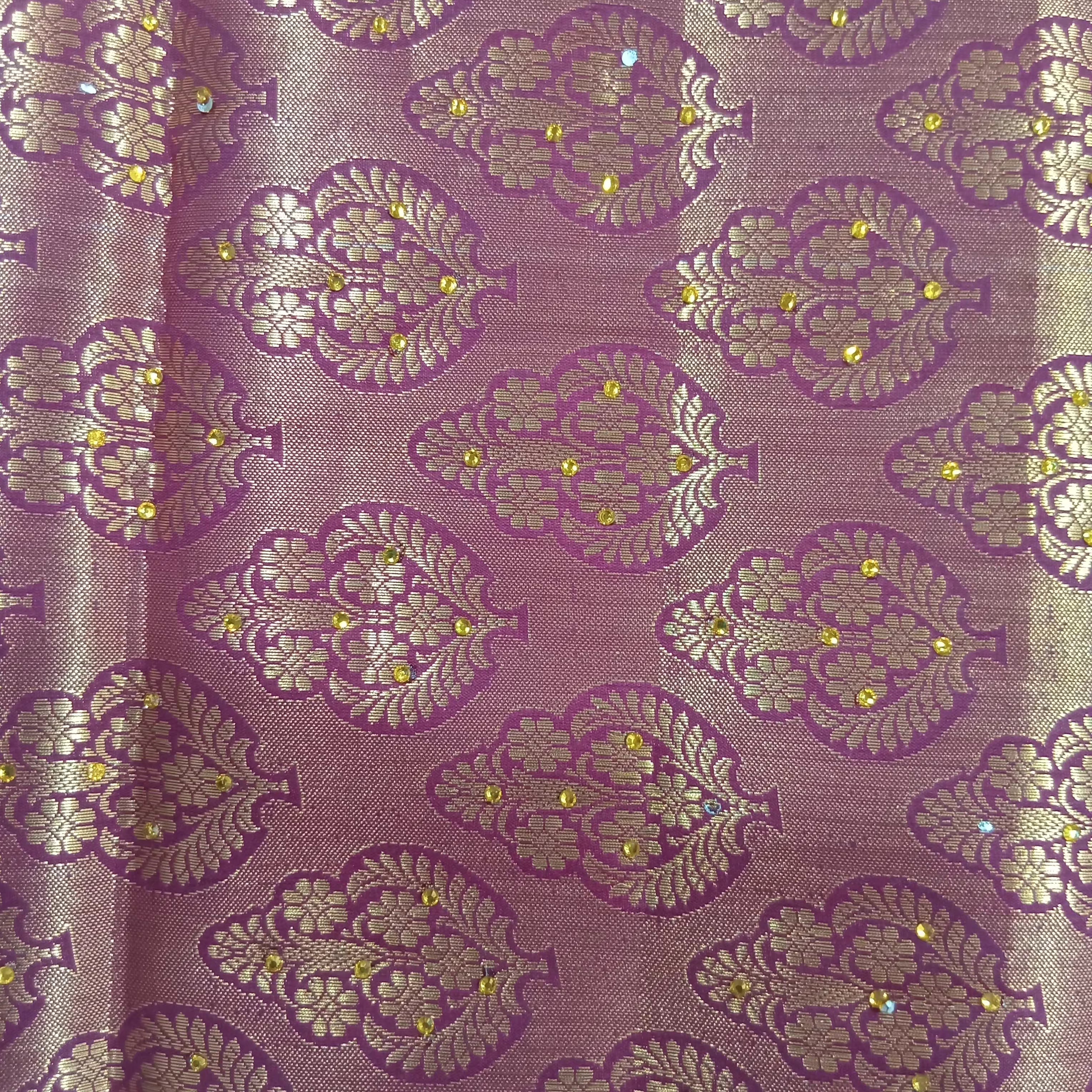 Kanchipuram Pure Silk Saree with detailed Gold Zari Butta motifs and luxurious Pallu with stick on Minakari in Maroon color