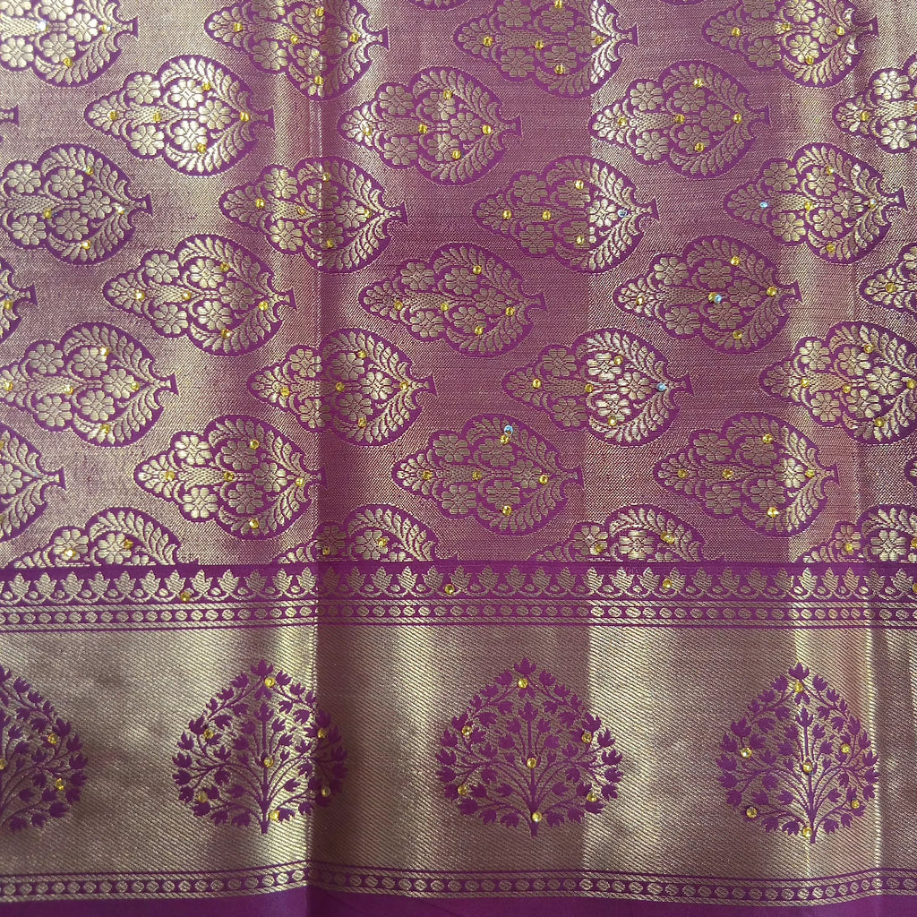 Kanchipuram Pure Silk Saree with detailed Gold Zari Butta motifs and luxurious Pallu with stick on Minakari in Maroon color