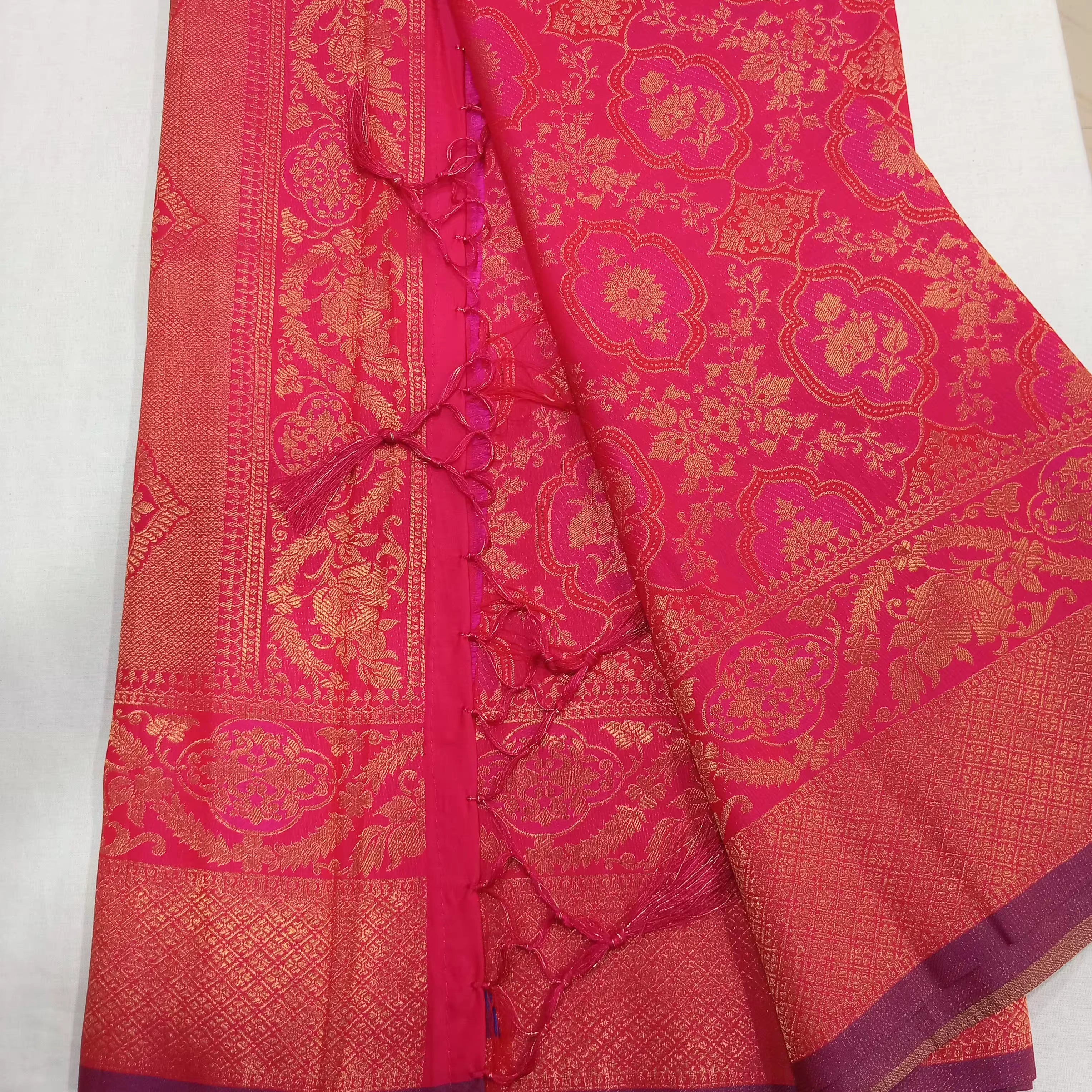 Kanchipuram Pure Silk Saree with detailed Butta motifs and luxurious Pallu in Royal Pink color