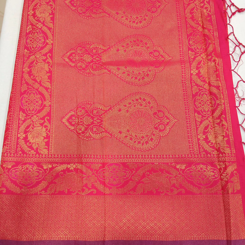 Kanchipuram Pure Silk Saree with detailed Butta motifs and luxurious Pallu in Royal Pink color