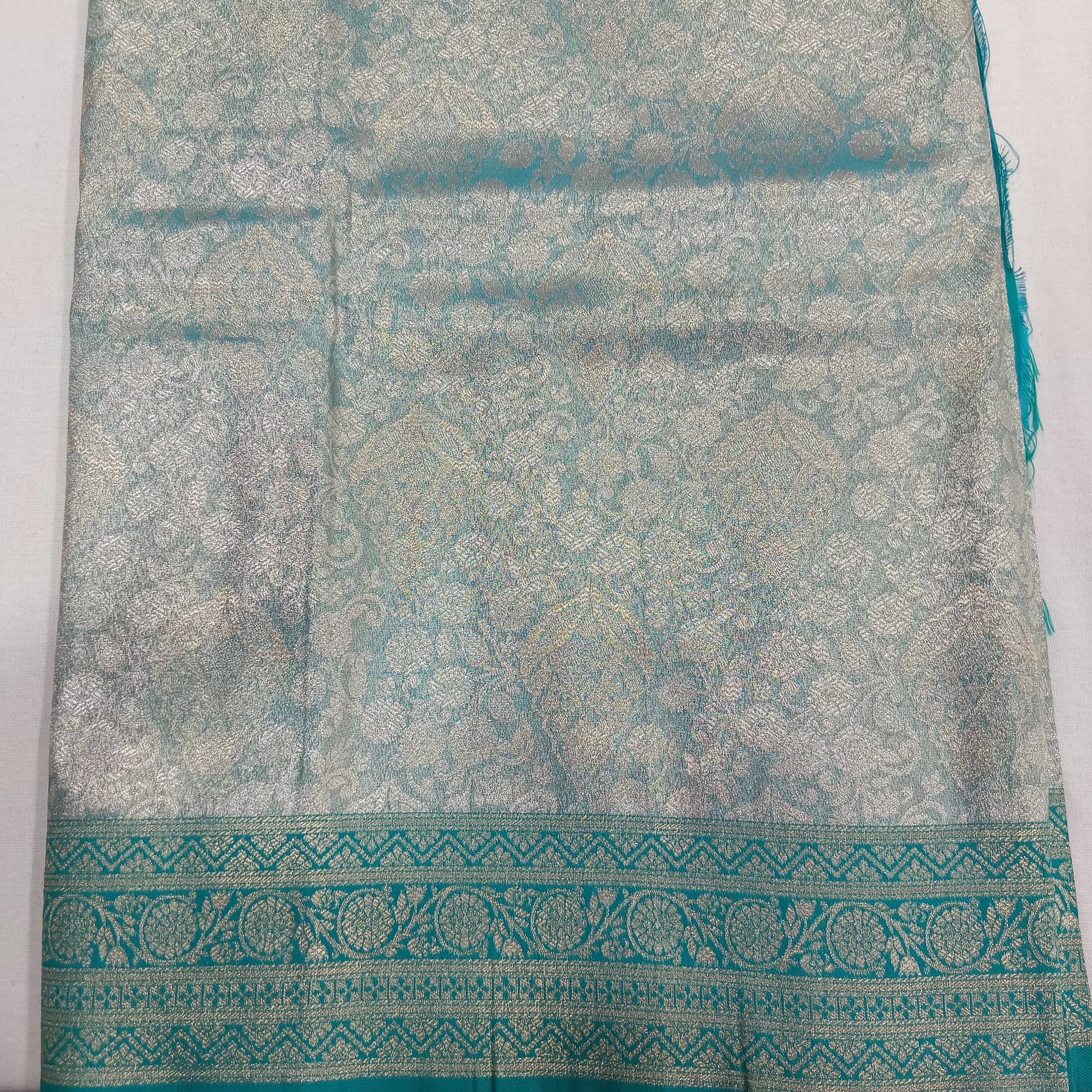 Kanchipuram Pure Silk Saree with detailed Butta motifs and luxurious Pallu in Two Tone Green color