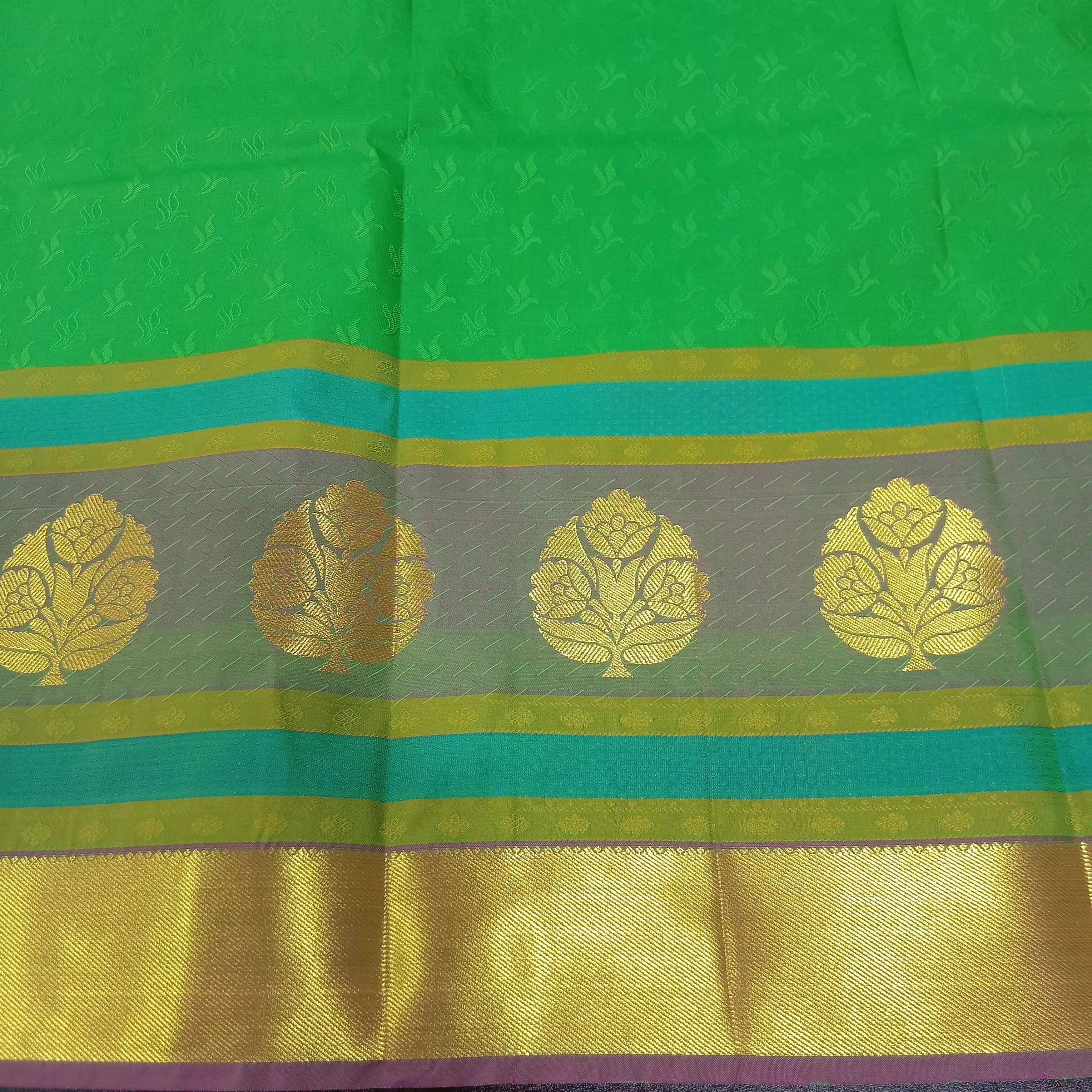 Kanchipuram Pure Silk saree with full mini Butta Motifs in Green Color