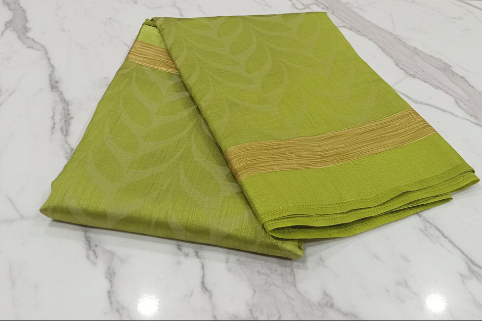 Tussar Silk saree with leaf pattern light weight saree organza drape with leaf pattern all over saree with mild gold thread border in Light Green Color
