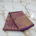 Banarasi Pure Silk Saree with beautiful birds and mango buttas with pretty gold zari work all over the saree in Royal Purple Color