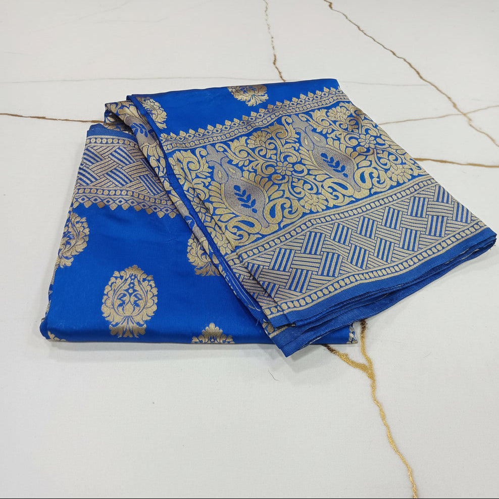 Banarasi Pure Silk Saree with beautiful buttas with pretty gold zari work all over the saree in Royal Blue color with wide gold zari border