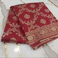 Banarasi Pure Silk Saree with beautiful buttas with pretty gold zari work all over the saree in Dark Red Color