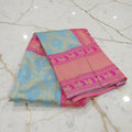 Banarasi Pure Silk Saree with beautiful buttas with pretty gold zari work all over the saree in Sky Blue Color with Pink Contrast