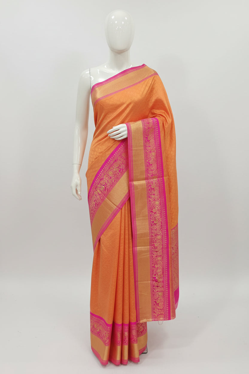 Banarasi Pure Silk Saree with beautiful buttas with pretty gold zari work all over the saree in Light Orange Color with Pink Contrast