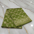 Banarasi Pure Silk Saree with beautiful buttas with pretty gold zari work all over the saree in Light Green Color