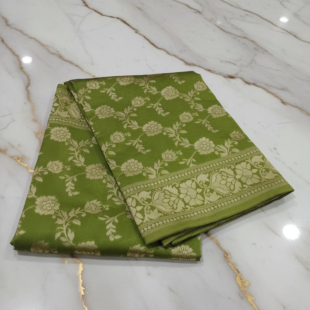 Banarasi Pure Silk Saree with beautiful buttas with pretty gold zari work all over the saree in Light Green Color