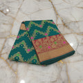 Banarasi Pure Silk Saree with beautiful buttas with pretty gold zari work all over the saree in Green Color with maroon border
