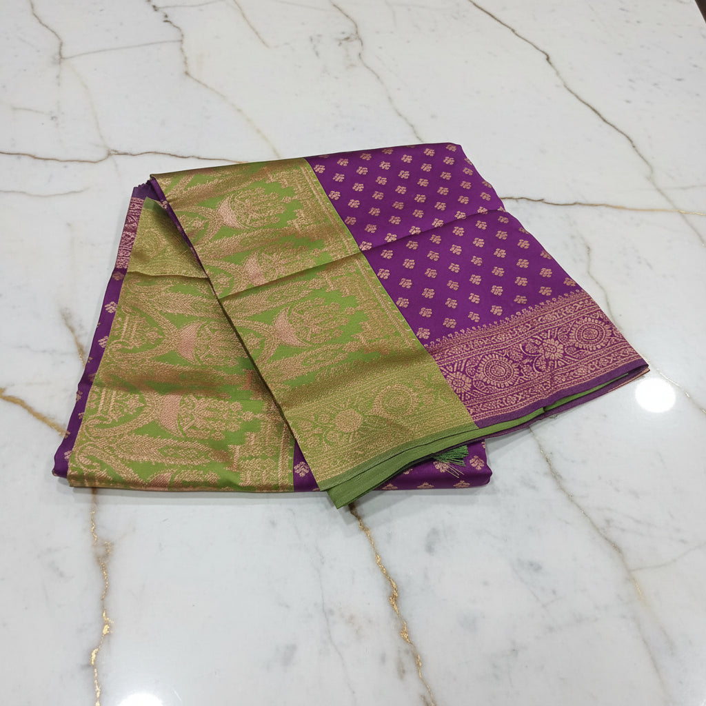 Banarasi Pure Silk Saree with luxurious Gold Zari Floral Buttas all over the saree and Pallu in Purple Color Green Contrast and Rose gold Zari