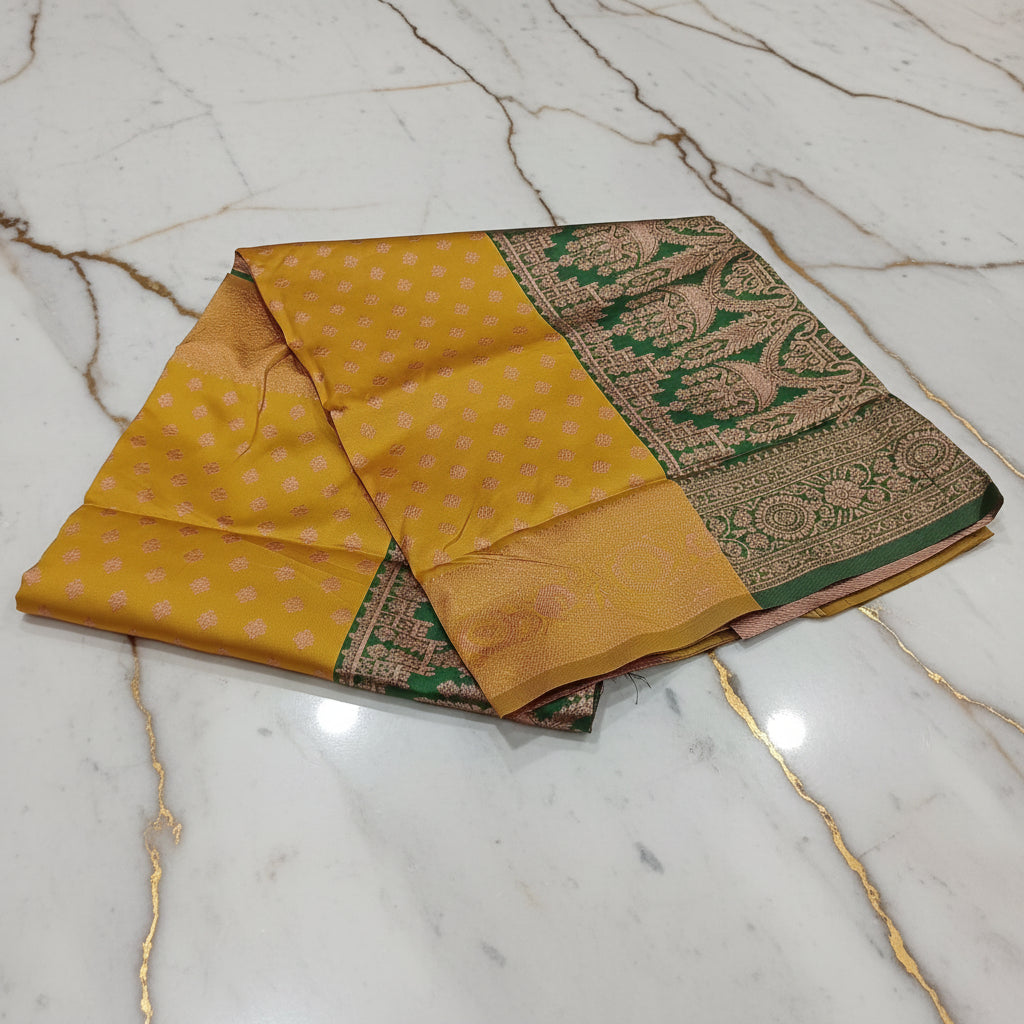 Banarasi Pure Silk Saree with luxurious Gold Zari Floral Buttas all over the saree and Pallu in Yellow Color Contrast Green and Rose gold Zari