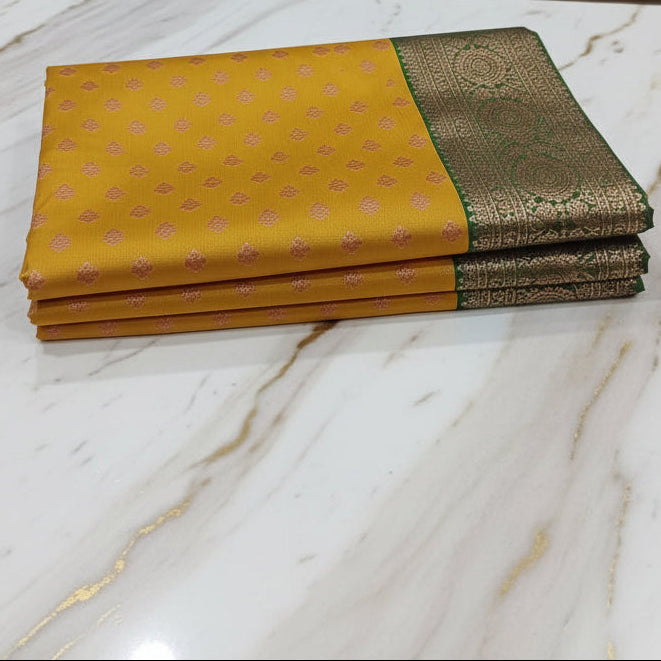 Banarasi Pure Silk Saree with luxurious Gold Zari Floral Buttas all over the saree and Pallu in Yellow Color Contrast Green and Rose gold Zari