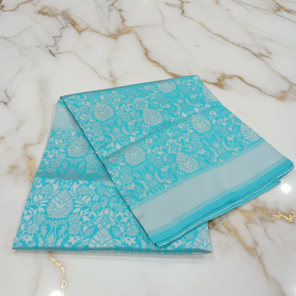 Silk Georgette saree with beautiful buttas , flowy drape elegant light weight Pattu Silk saree in Sky Blue color with silver zari