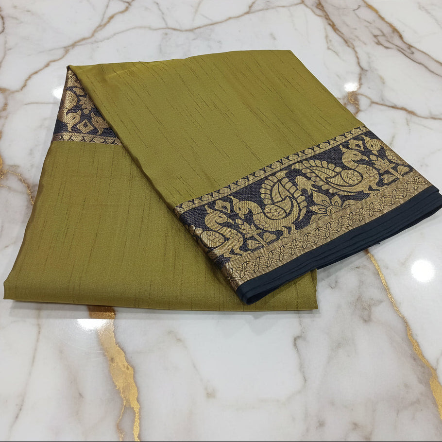 Silk Georgette saree with beautiful buttas , flowy drape elegant light weight Pattu Silk saree in Two tone Greenish Yellow with Black Gold Peacock Border