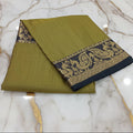 Silk Georgette saree with beautiful buttas , flowy drape elegant light weight Pattu Silk saree in Two tone Greenish Yellow with Black Gold Peacock Border