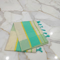 Tissue Silk Saree with Gold Kasavu Authentic Kerala Kasavu Saree in Cream Color with wide Turquoise color bands and tassels