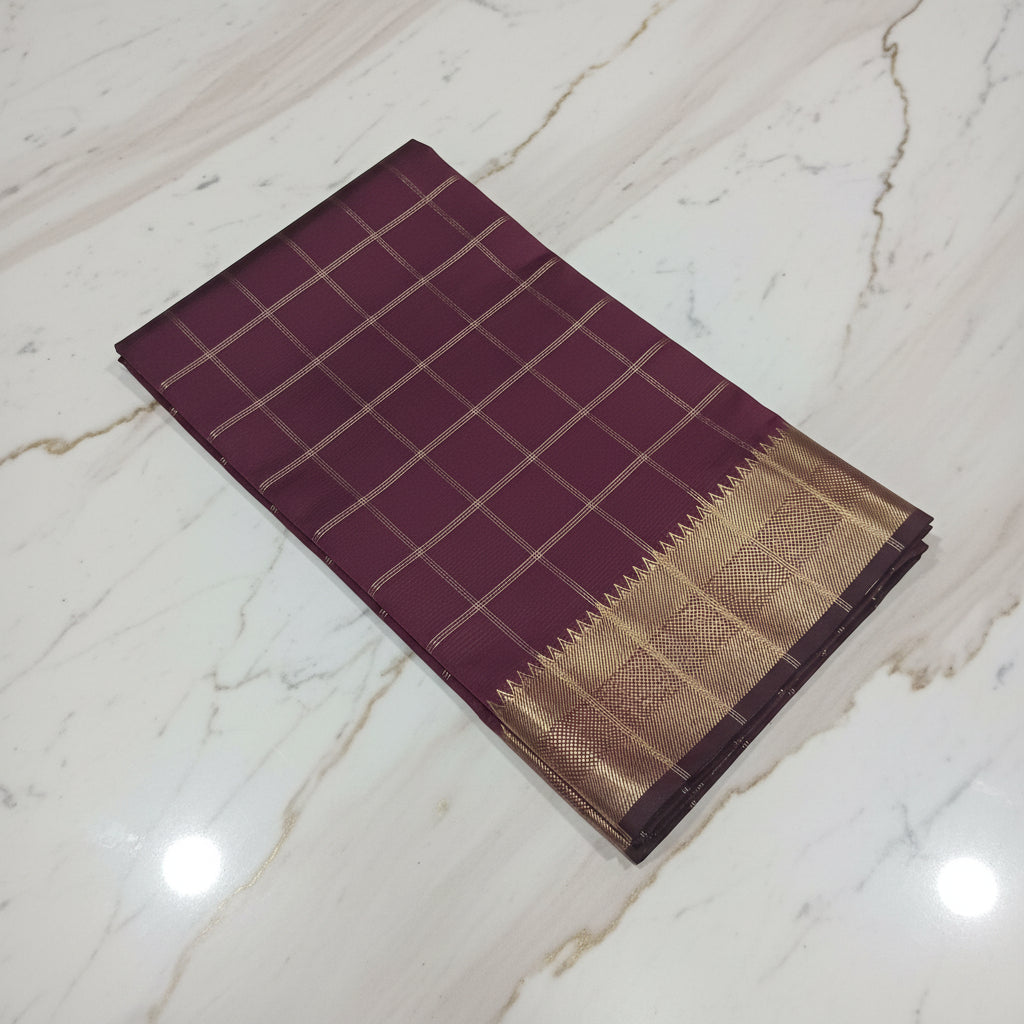 Kanchipuram Silk saree with Gold Zari big checkered pattern with Gold Butta all over saree and pallu in Maroon Color