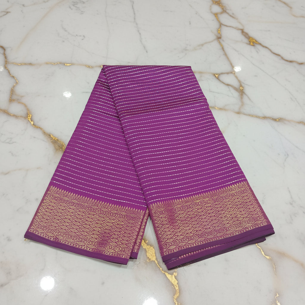 Kanchipuram Silk saree with Gold Zari Lined pattern with Gold Butta all over saree and pallu in Purple Color