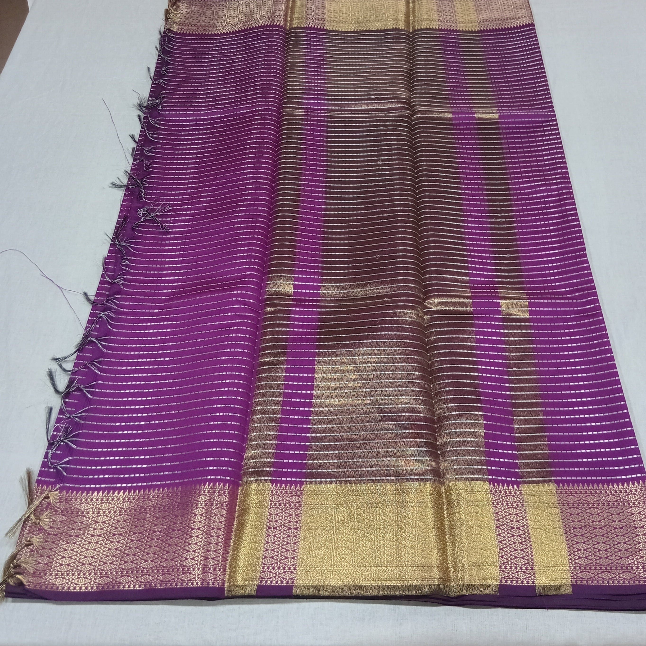 Kanchipuram Silk saree with Gold Zari Lined pattern with Gold Butta all over saree and pallu in Purple Color