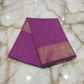 Kanchipuram Silk saree with Gold Zari Lined pattern with Gold Butta all over saree and pallu in Purple Color